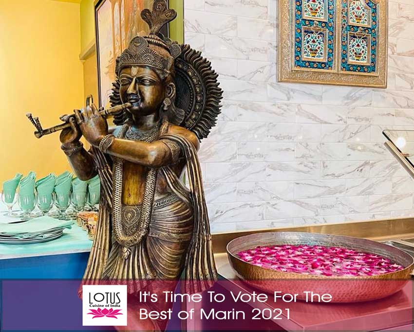 Lotus Cuisine of India - It's Time To Vote For The Next Best of Marin 2021 - A statue, with a container of flower petals, logo and text.