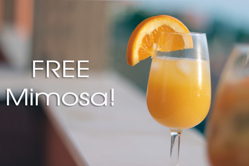 Lotus Cuisine of India - Free Mimosas at Lotus for Sunday Brunch - A glass of mimosa with a slice of orange and texts.